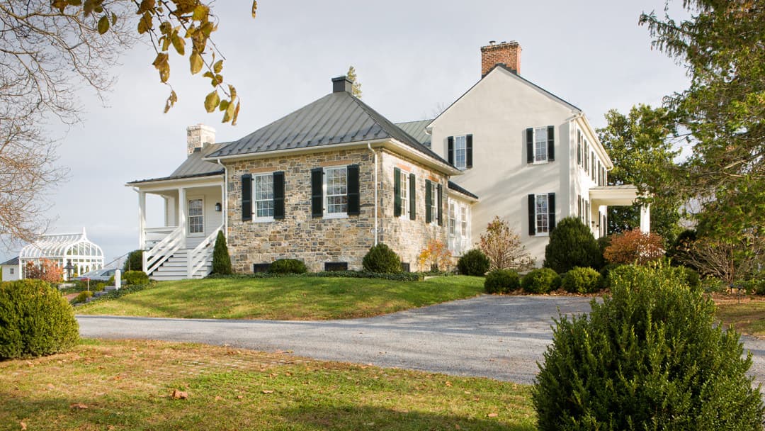 Seamless new addition to 1816 federal farmhouse in Virginia countryside.