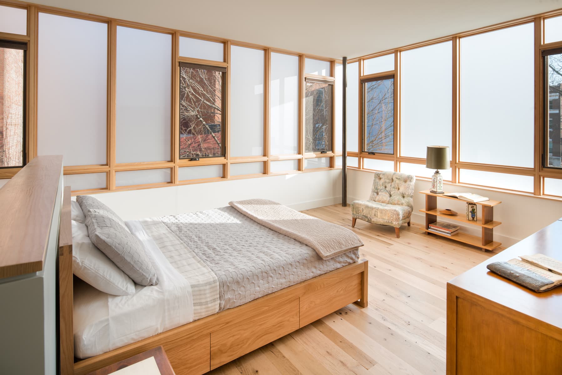 Glazed sleeping porch master bedroom