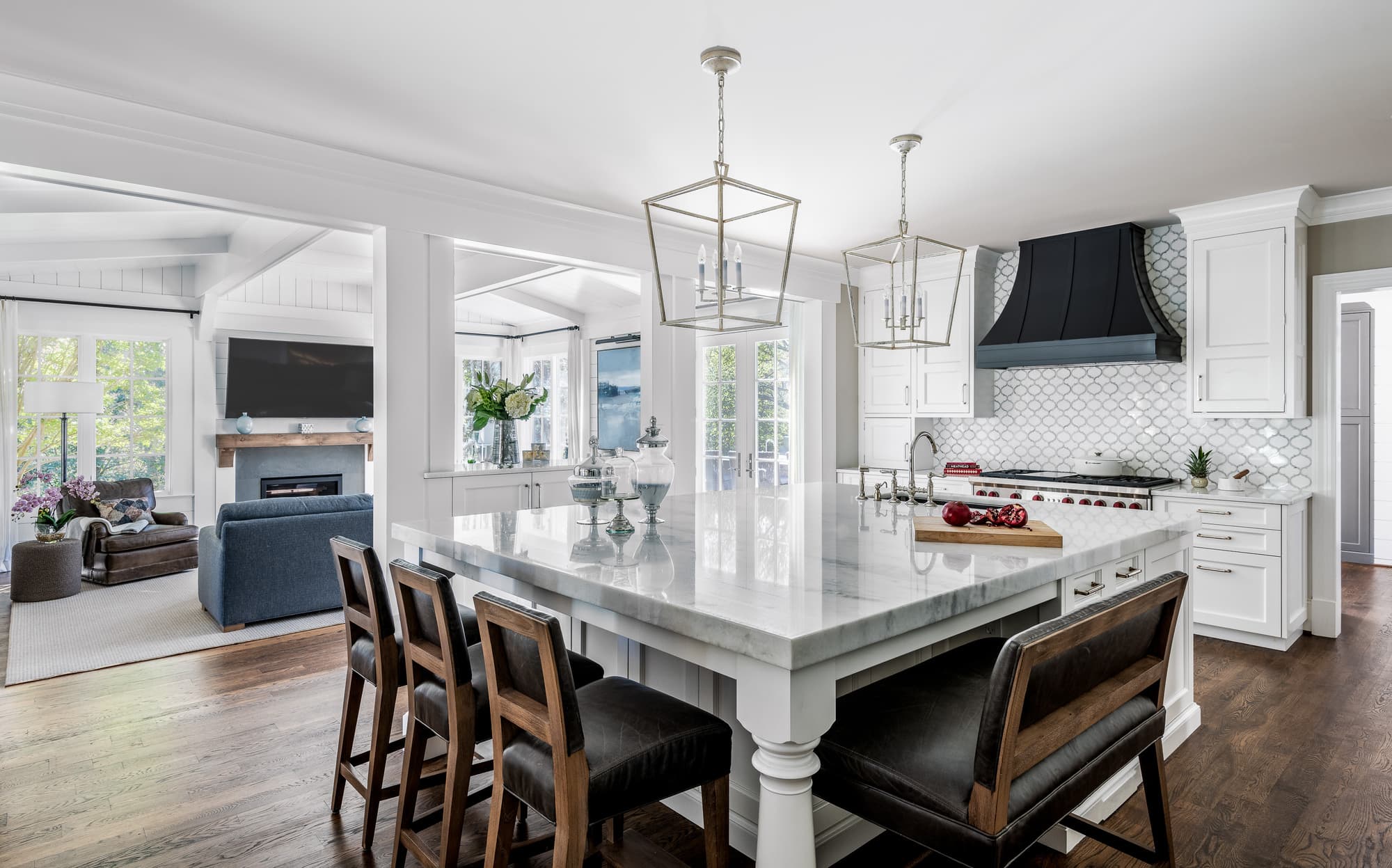 Home renovation including kitchen, family room, porch, and patios.