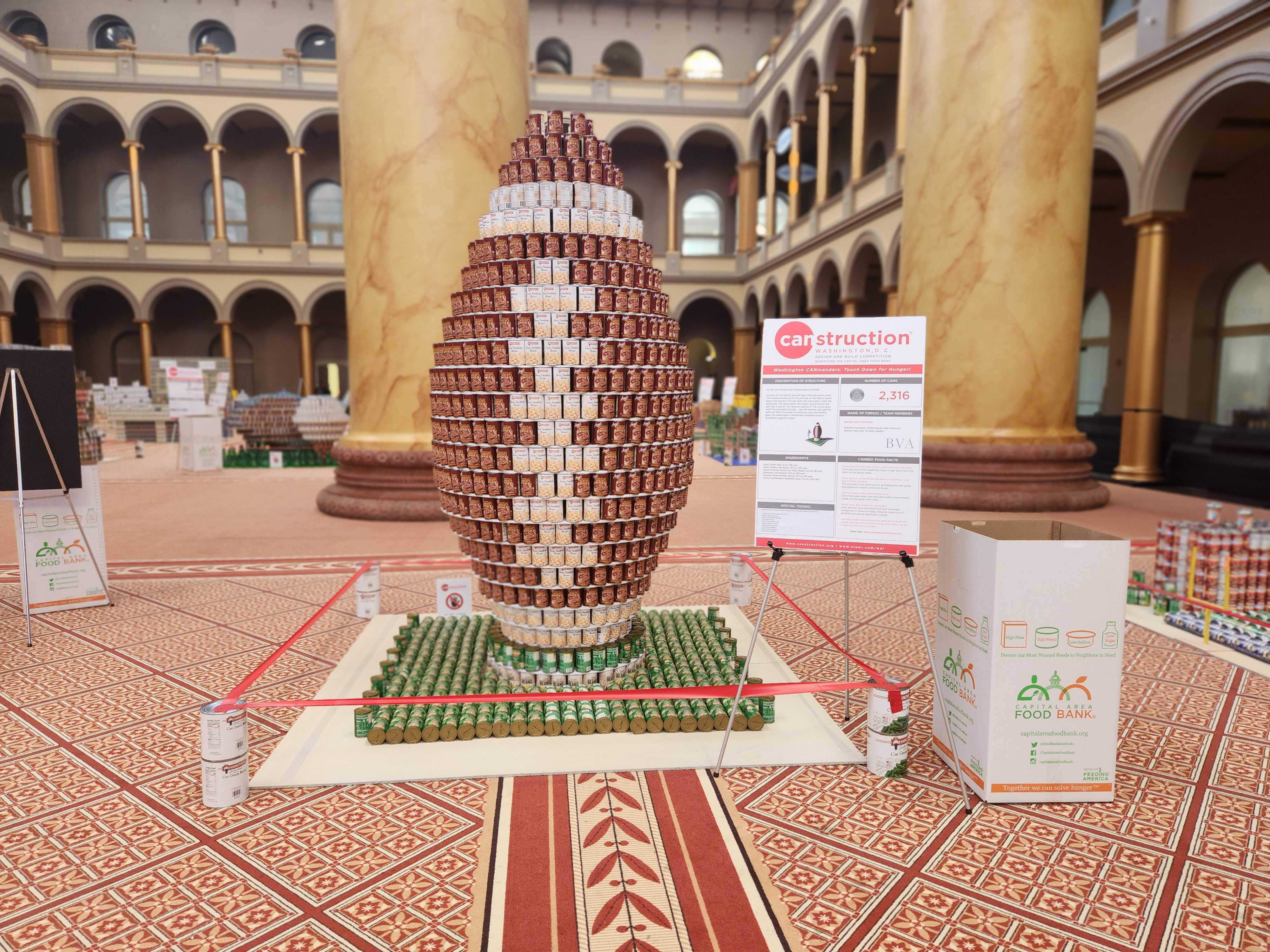 Image of canned food sculpture in shape of football