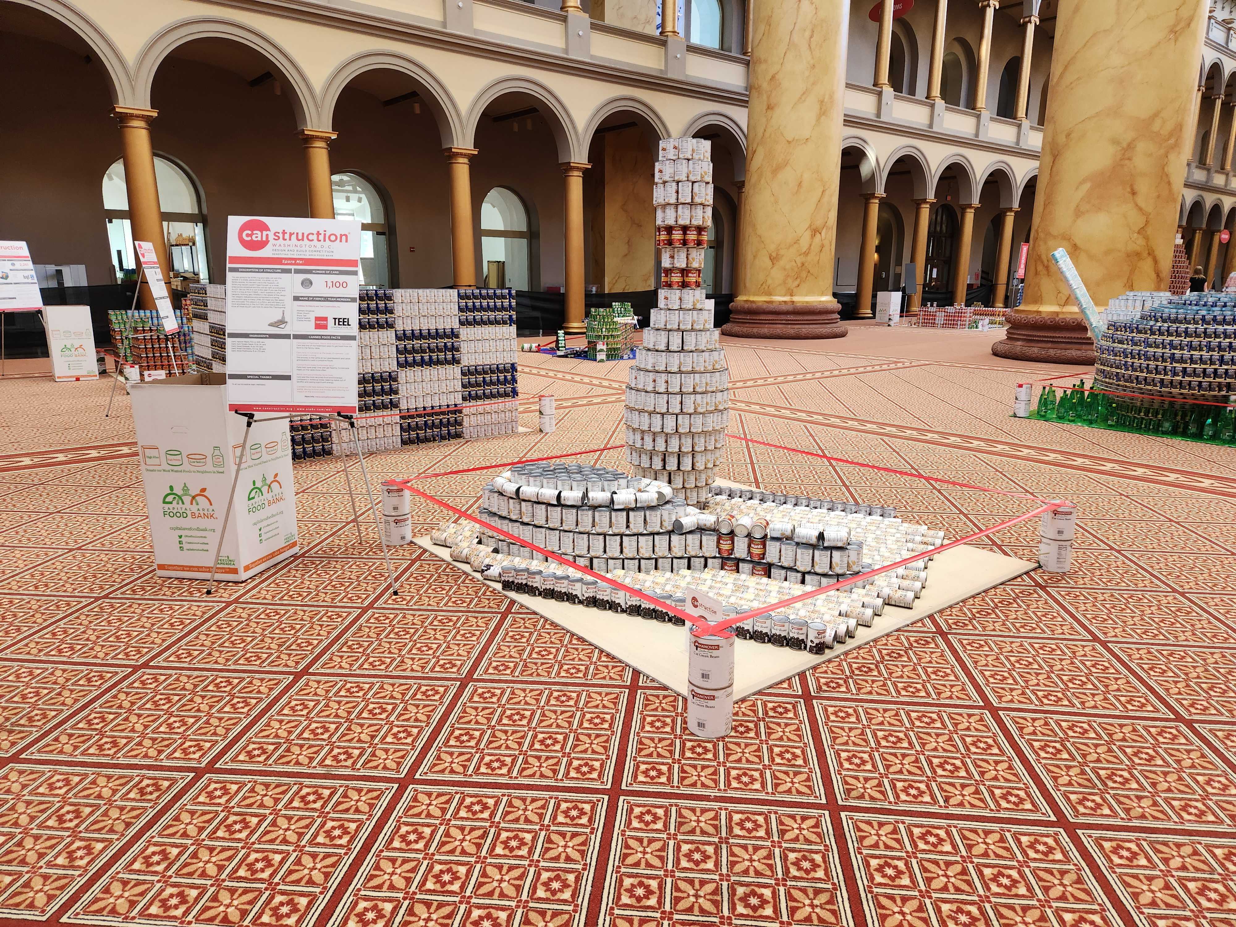 Image of canned food sculpture in shape of bowling pins