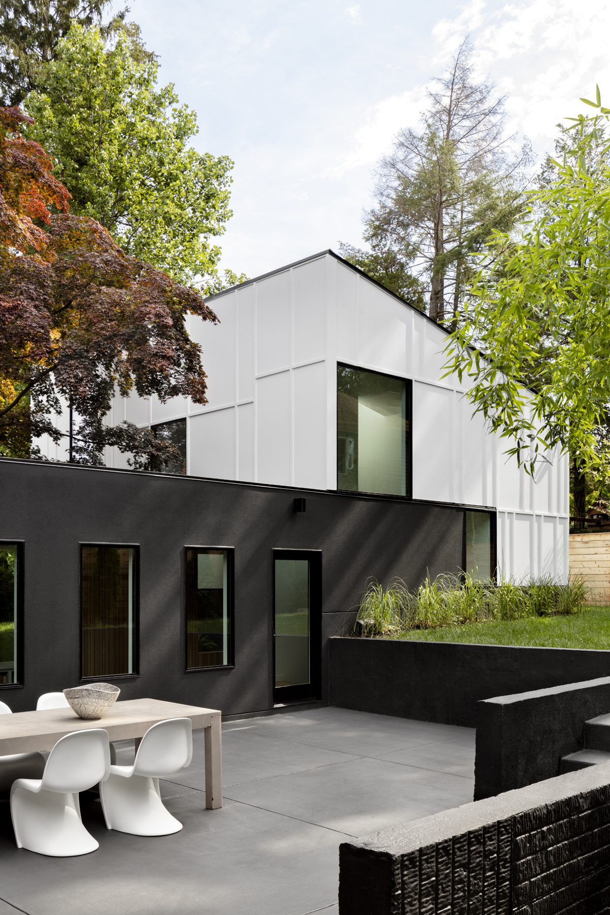 Courtyard of new addition and gallery around existing maple tree