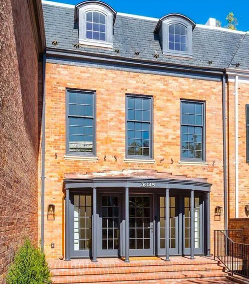 Expansion & Renovation of Georgetown townhome including new portico and dormers